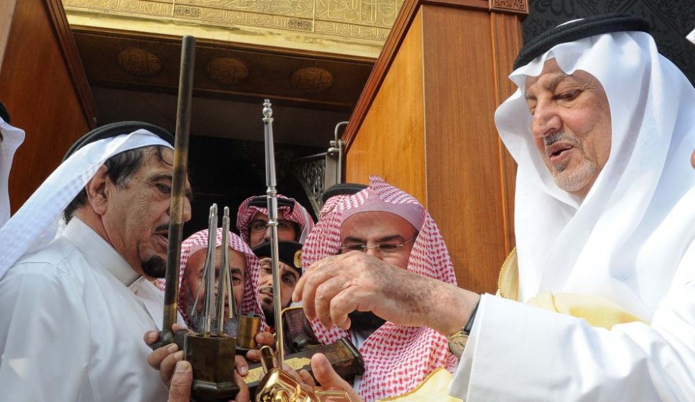 On behalf of King Salman, Khalid Al-Faisal washes the Kaaba