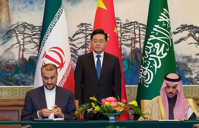 Chinese Foreign Minister Qin Gang (centre), witness his Iran’s counterpart Hossein Amirabdollahian (left) and Saudi Arabian counterpart Prince Faisal bin Farhan Al Saud, right, signing of a joint statement between Riyadh and Tehran, in Beijing. File/Associated Press"