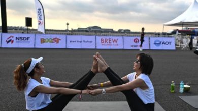 'Feel like a beautiful bird': Mass Yoga Session in Bangkok Airport