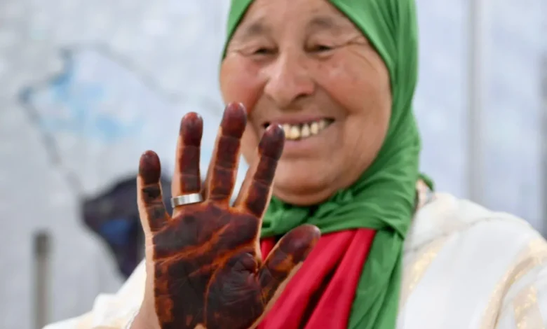 Henna Adorns Hands of Moroccan Women Pilgrims on Their Way to Makkah